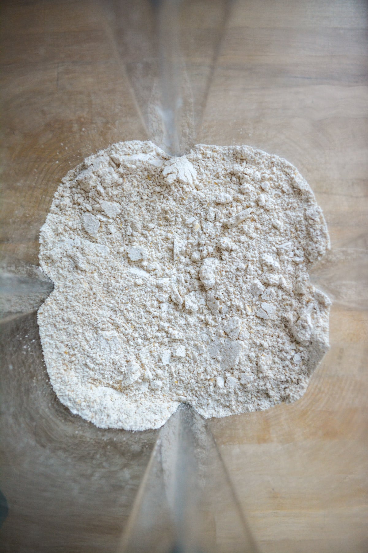Homemade oat flour in the pitcher of a blender.