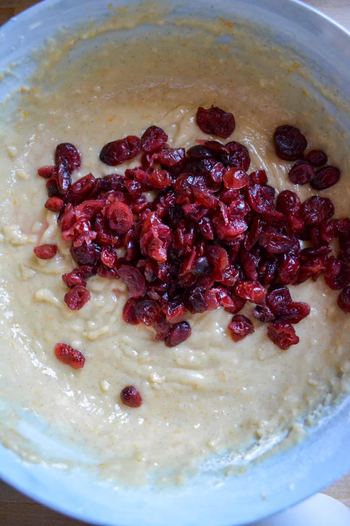 Cranberries added to the muffin batter.