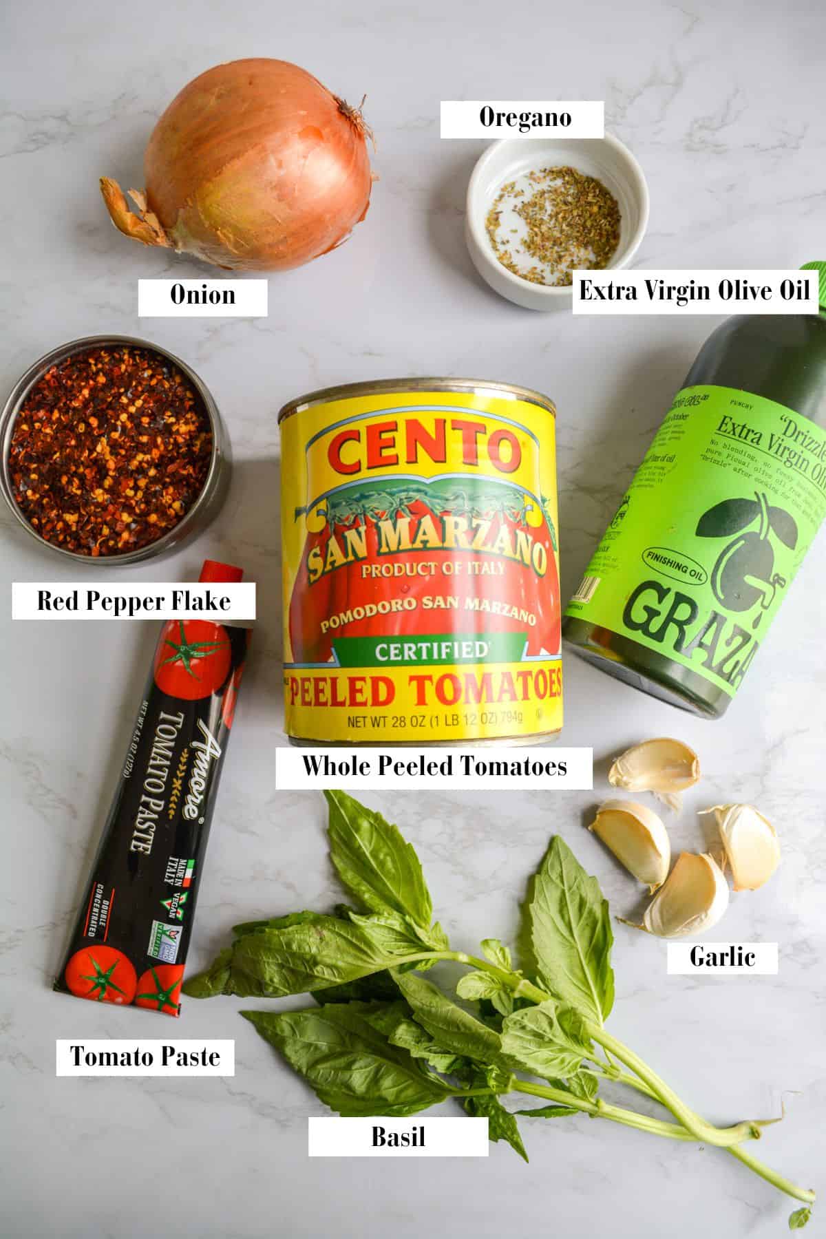 Ingredients needed to make vegan hearty marinara sauce.