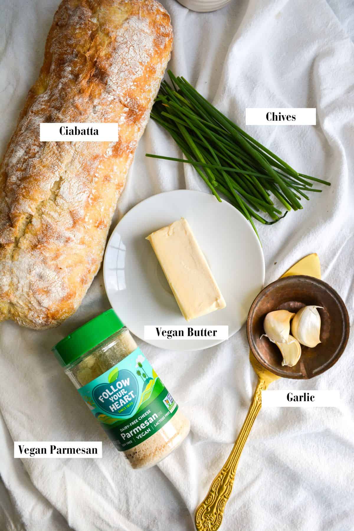 Ingredients for making Vegan Cheesy Garlic Bread.