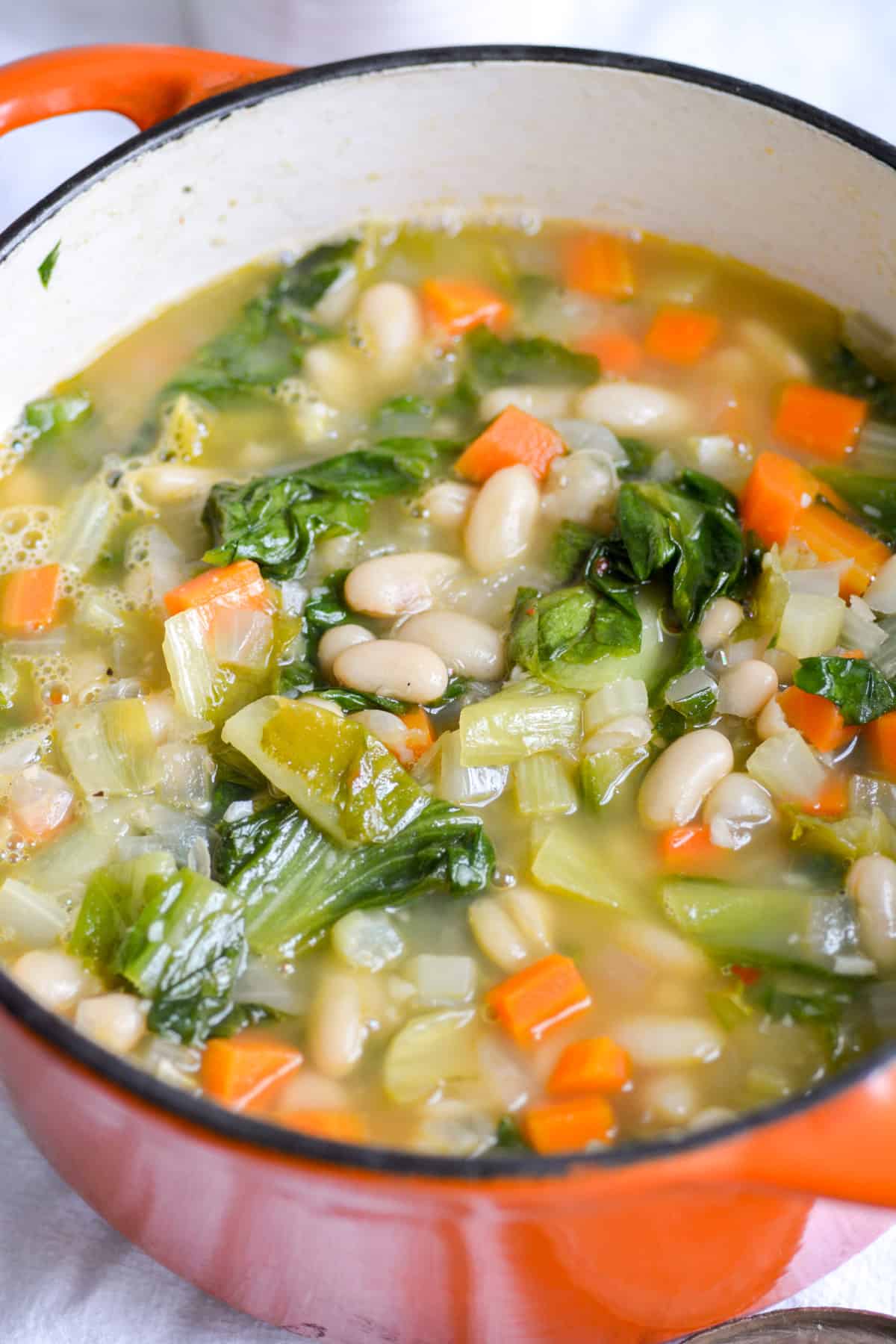 Escarole and White Bean Soup in a large dutch oven.