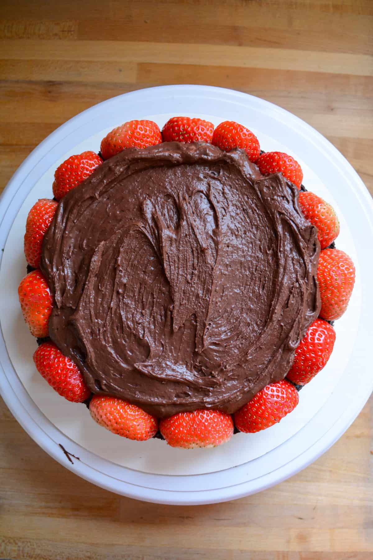 Vegan chocolate fudge filling added into the middle of the strawberries.