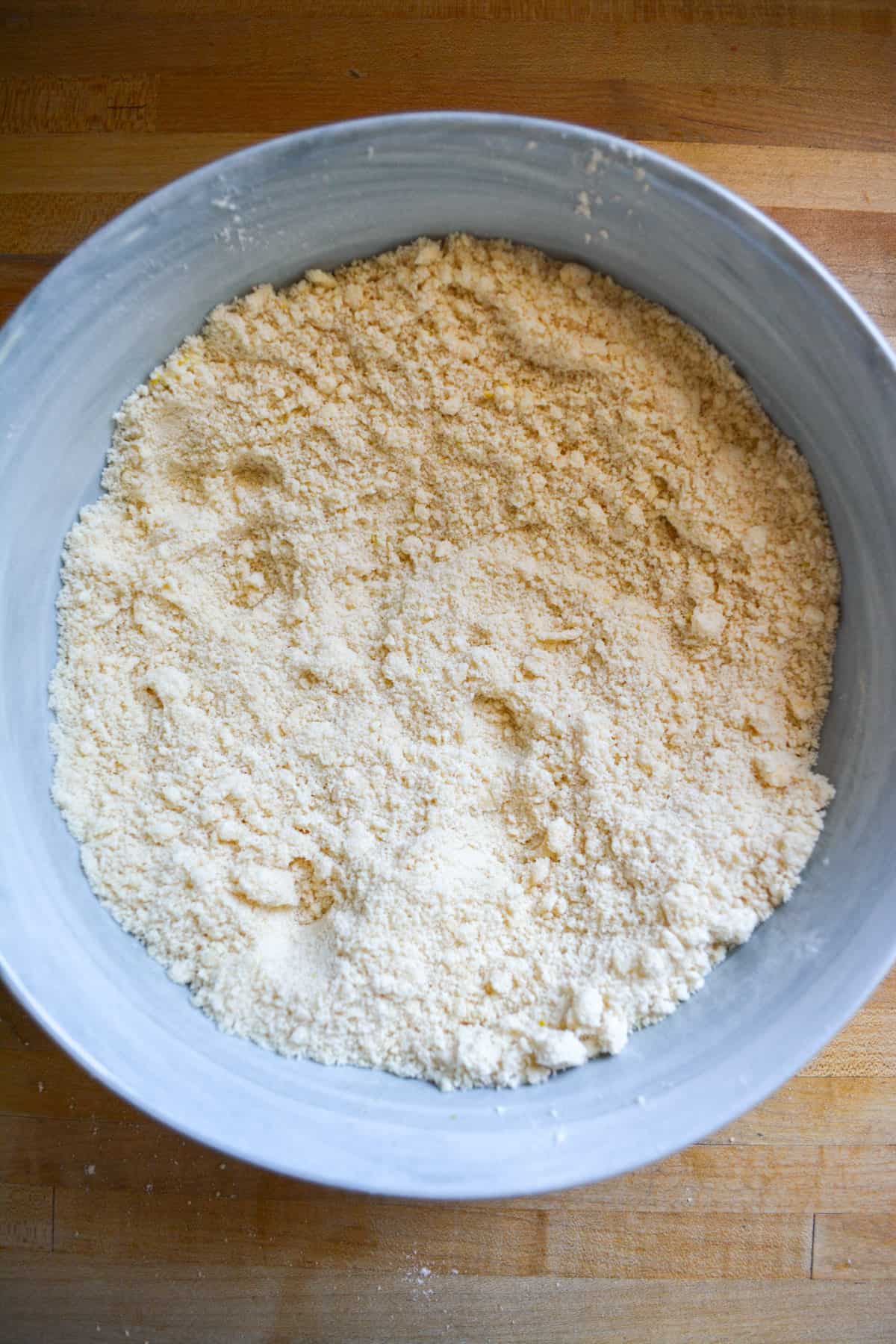 Dairy-free butter cut into the dry ingredients until the mixture looks like a coarse meal.