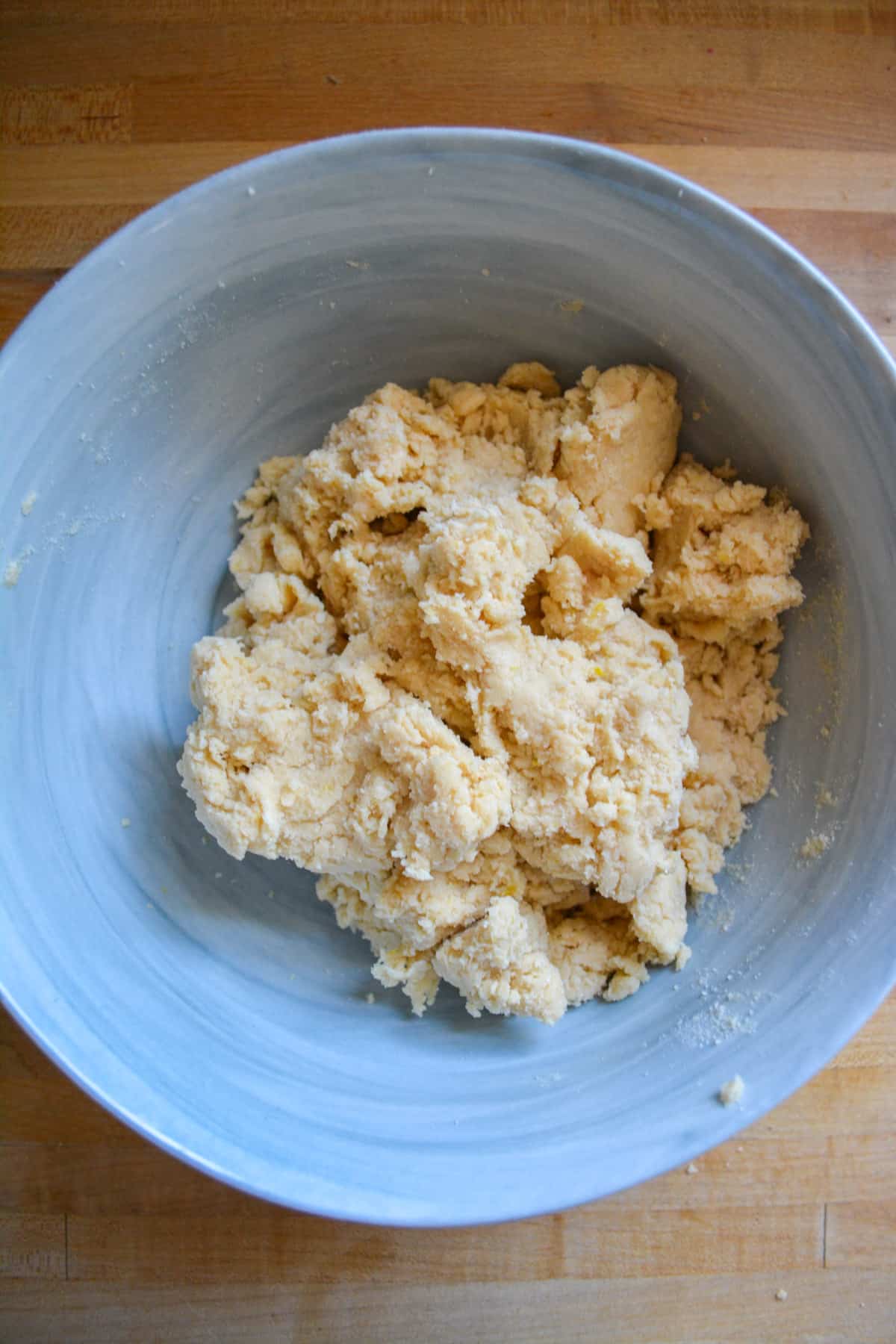 Vegan scone dough in a mixing bowl.