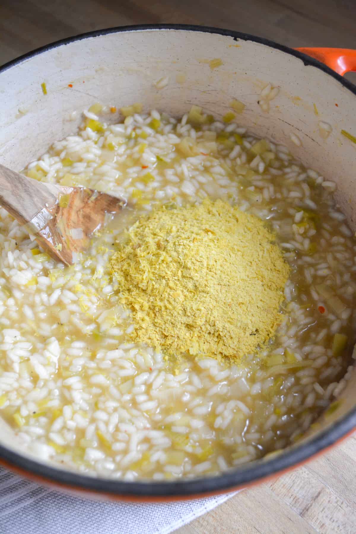 Finished risotto with lemon zest and nutritional yeast added into the pot.