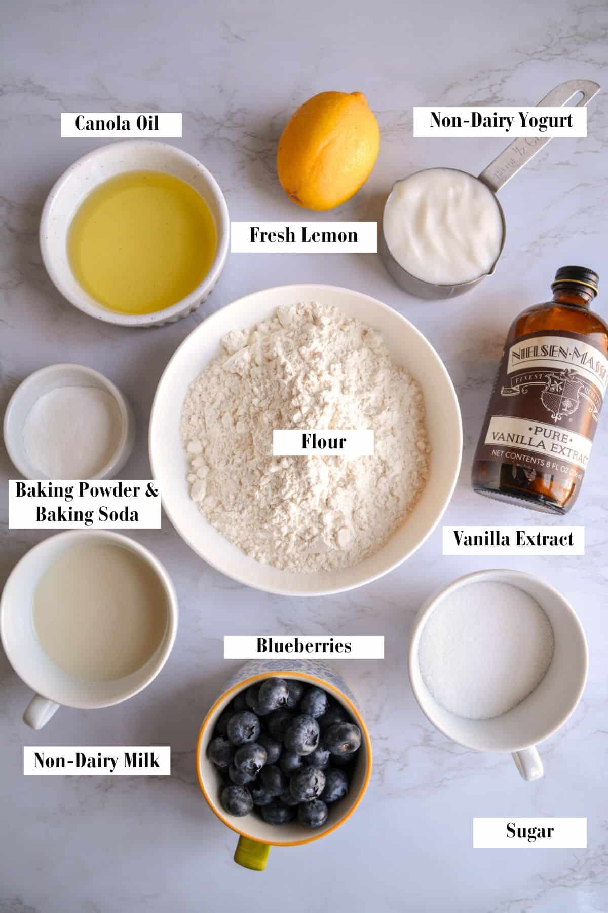 The ingredients needed to make this recipe in bowls on a marble surface.