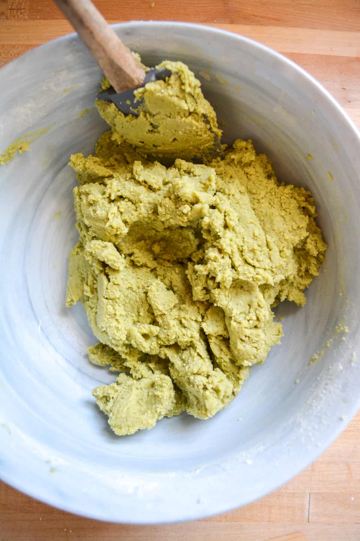 Matcha powder, and dry ingredients mixed into the sugar cookie dough.