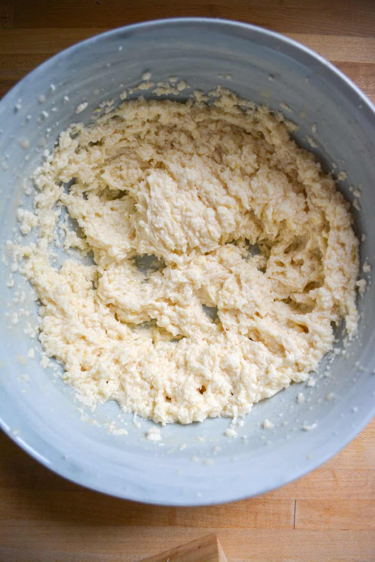 Half of the wet ingredients mixed into to butter and sugar mixture.