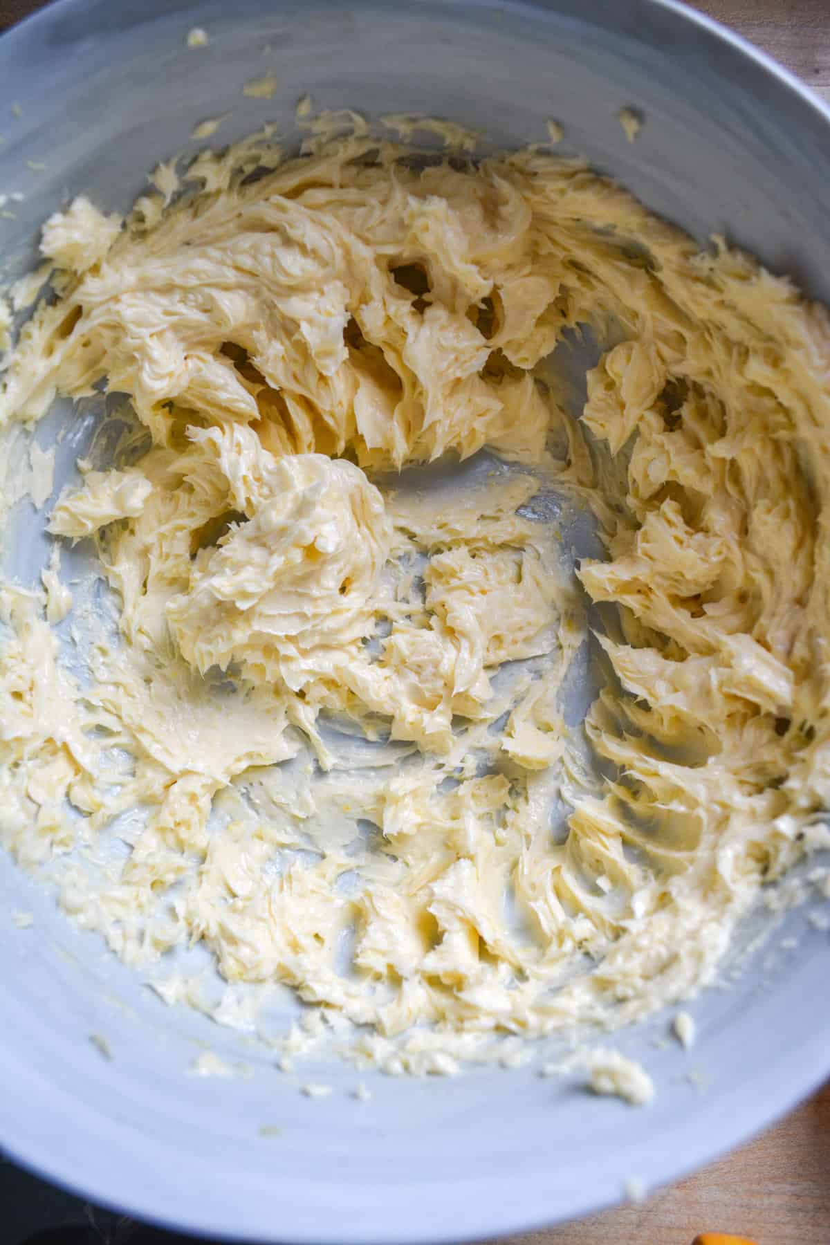 Vegan butter creamed in a large mixing bowl.