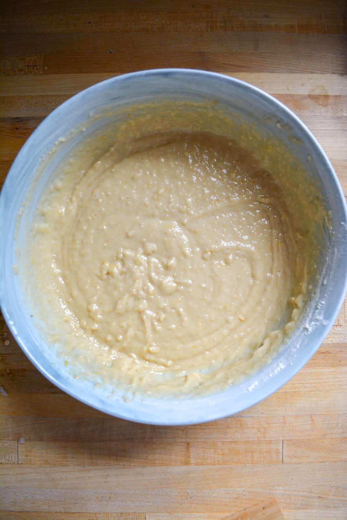 Muffin batter in a mixing bowl.