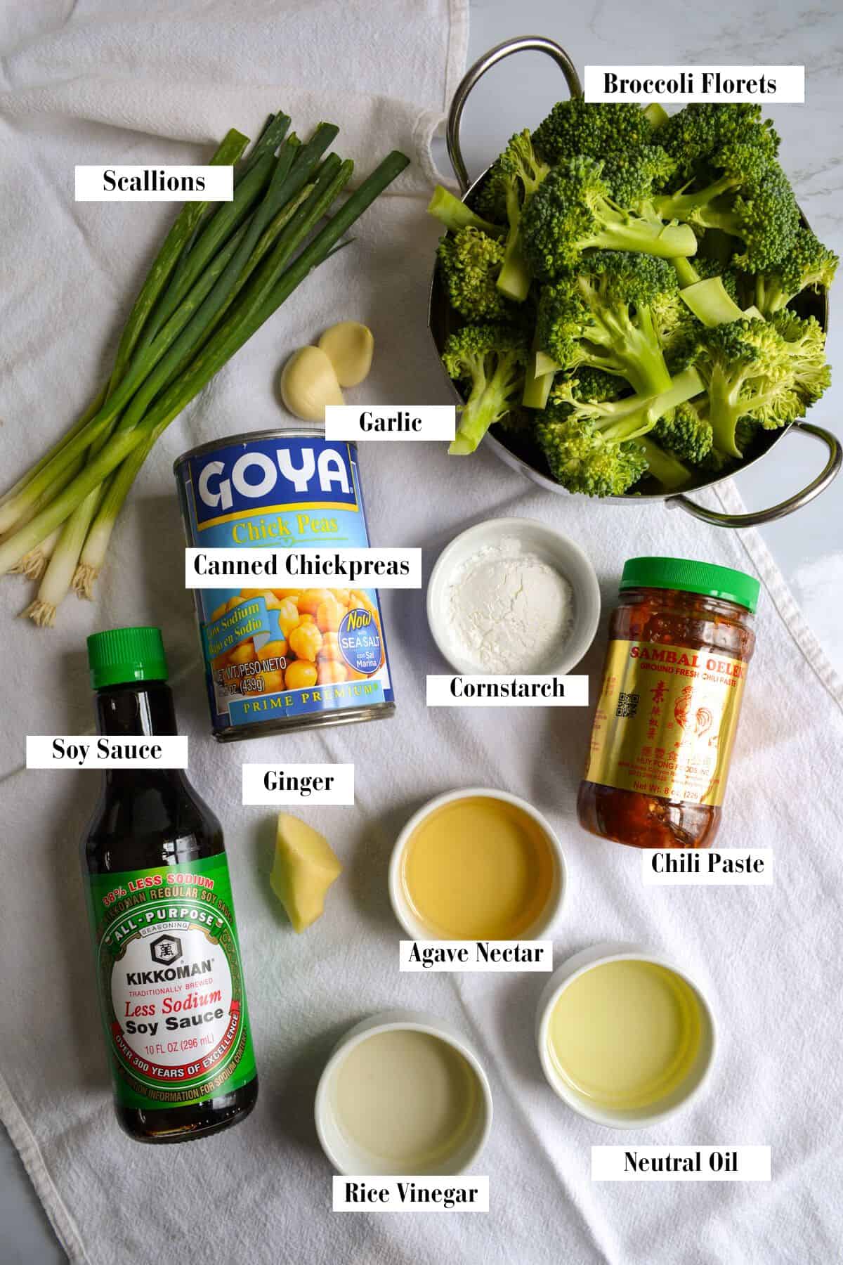 Ingredients for this recipe in small bowls on a cloth.