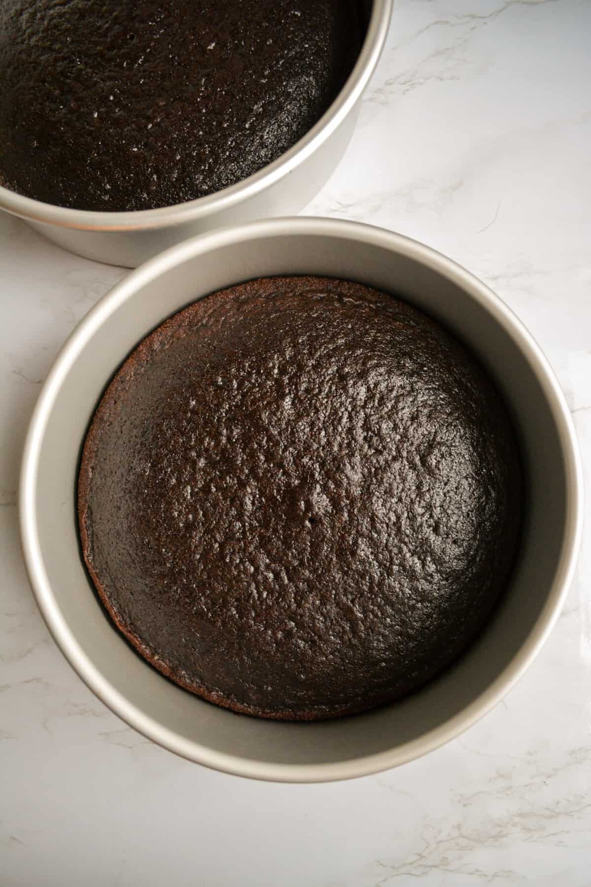 Baked chocolate cakes in  8 inch round cake pans.