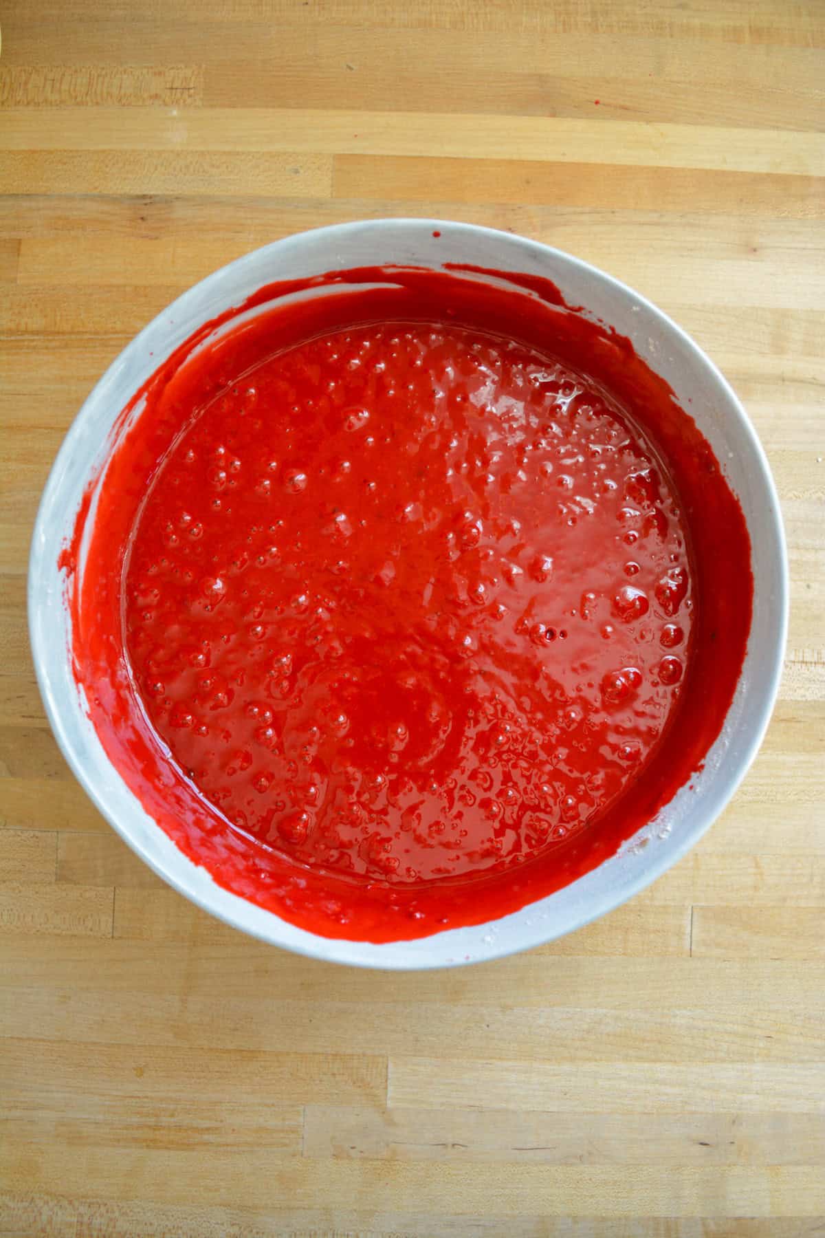 Vegan Red Velvet Cake batter in a large mixing bowl.