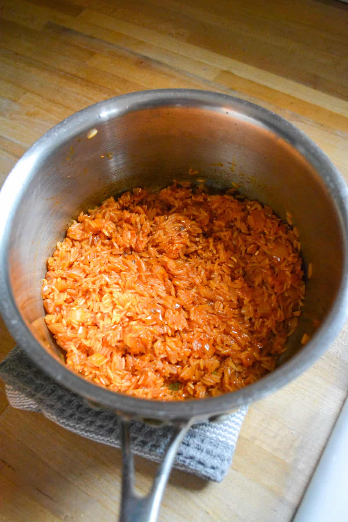 Toasting the rice in a sauce pan.