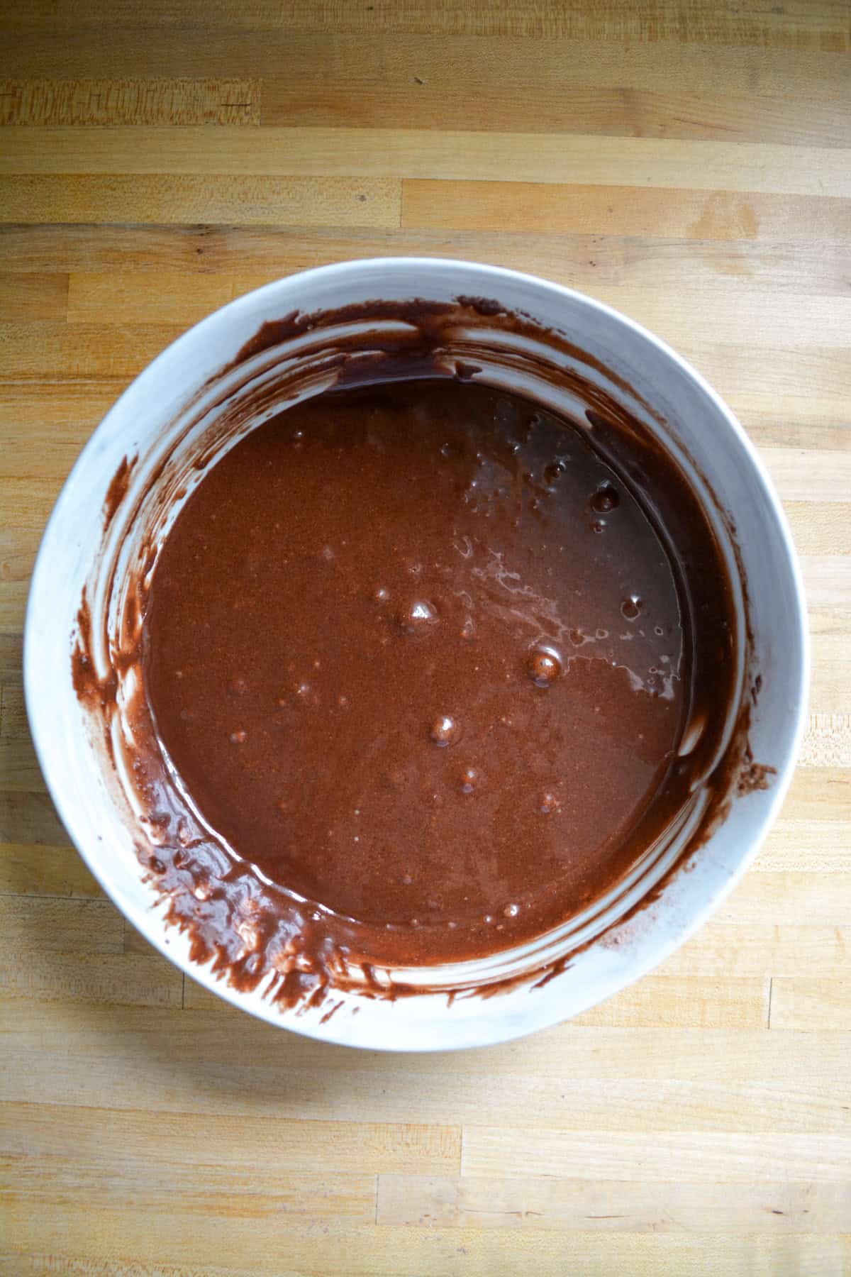 Vegan Chocolate Cupcake batter mixed together in a large bowl.