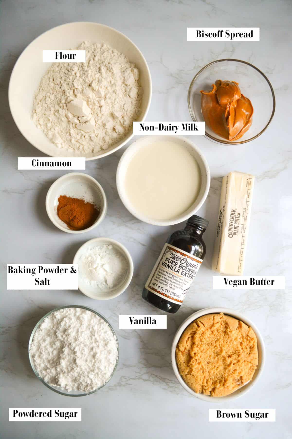 Ingredients for making this recipe in small bowls on a marble surface.