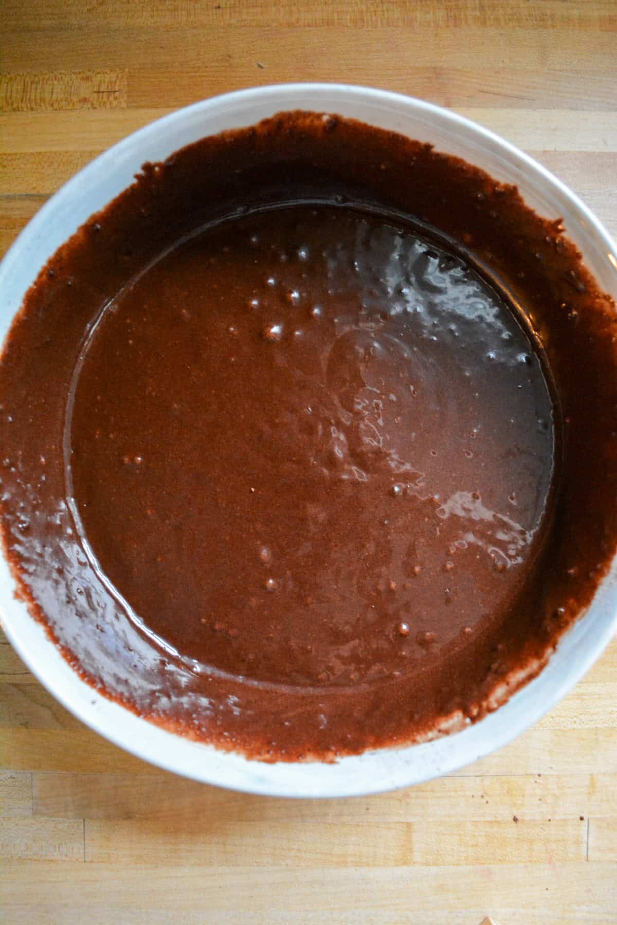 Vegan chocolate cake batter in a large mixing bowl.