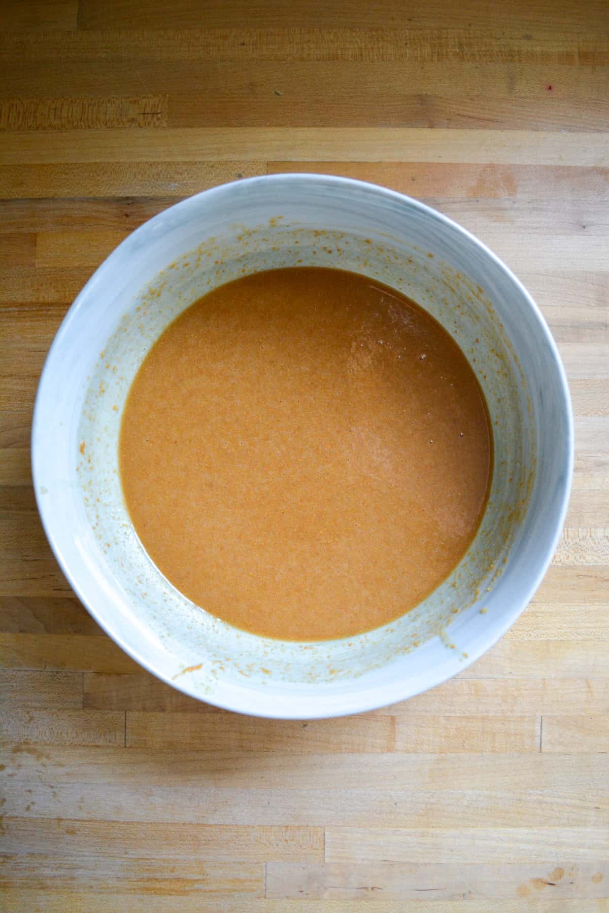 Wet ingredients in a large mixing bowl.