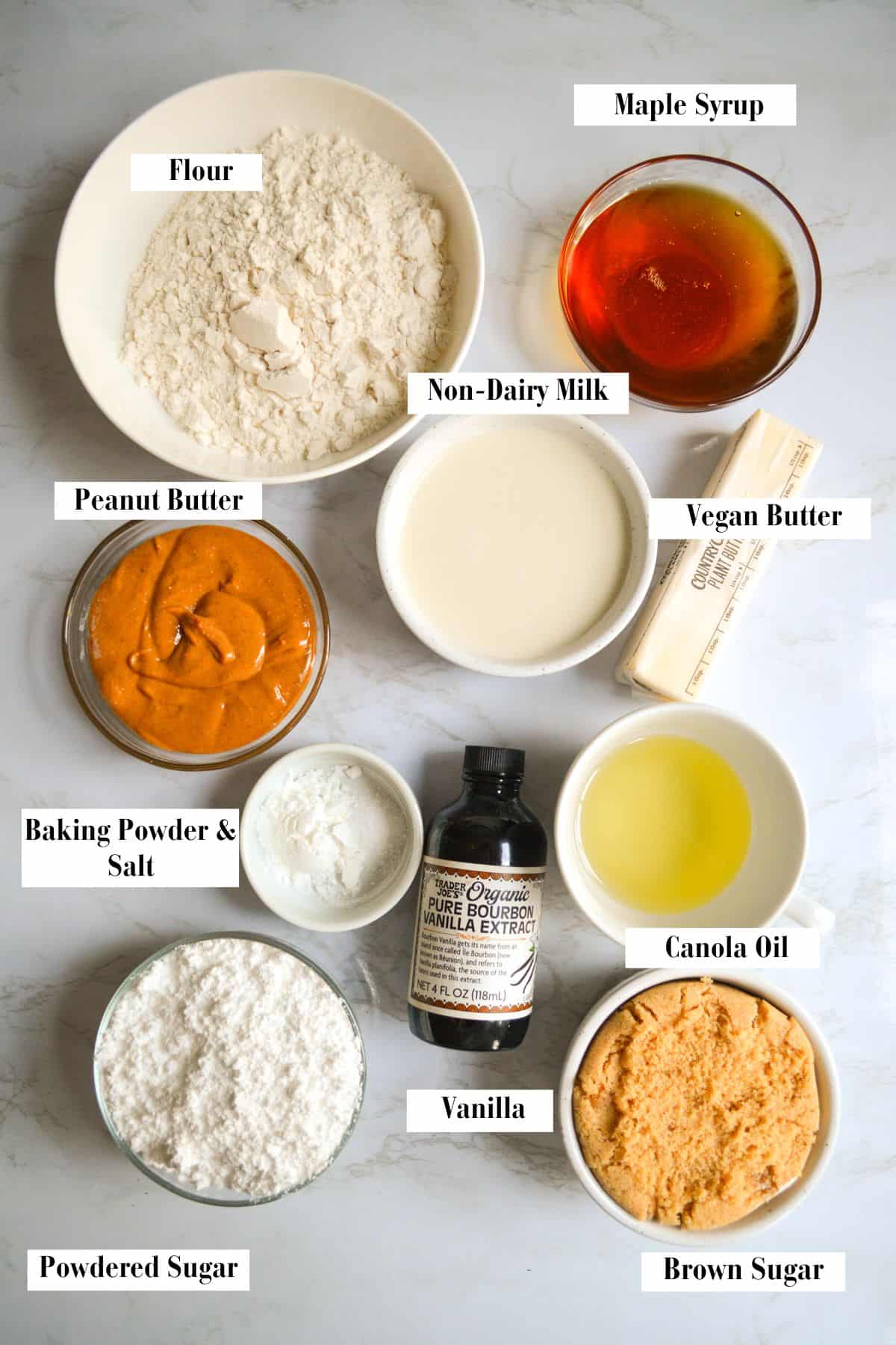 Ingredients for making this recipe in small bowls on a marble surface.