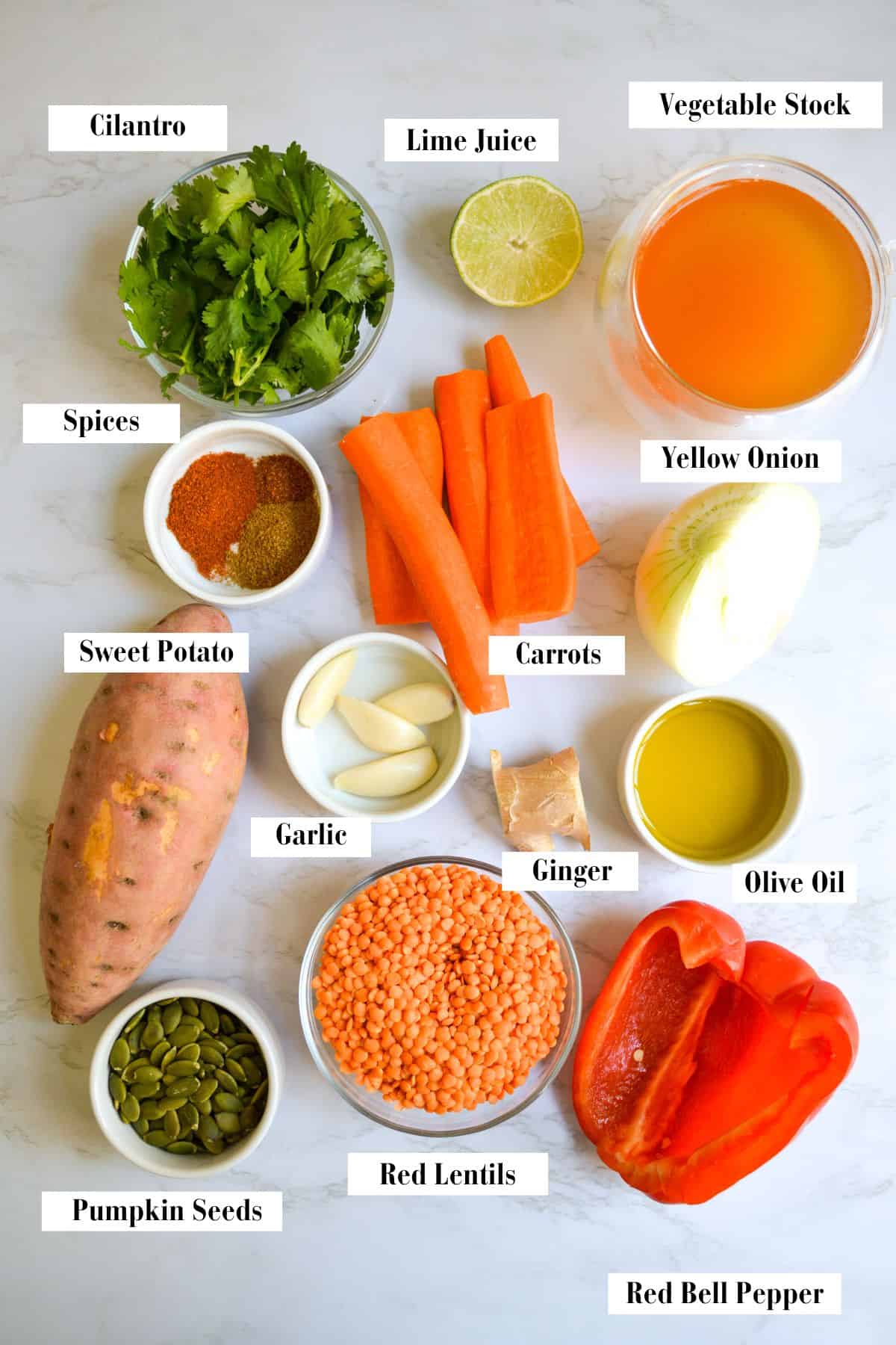 Ingredients for making this recipe in small bowls on a marble surface.