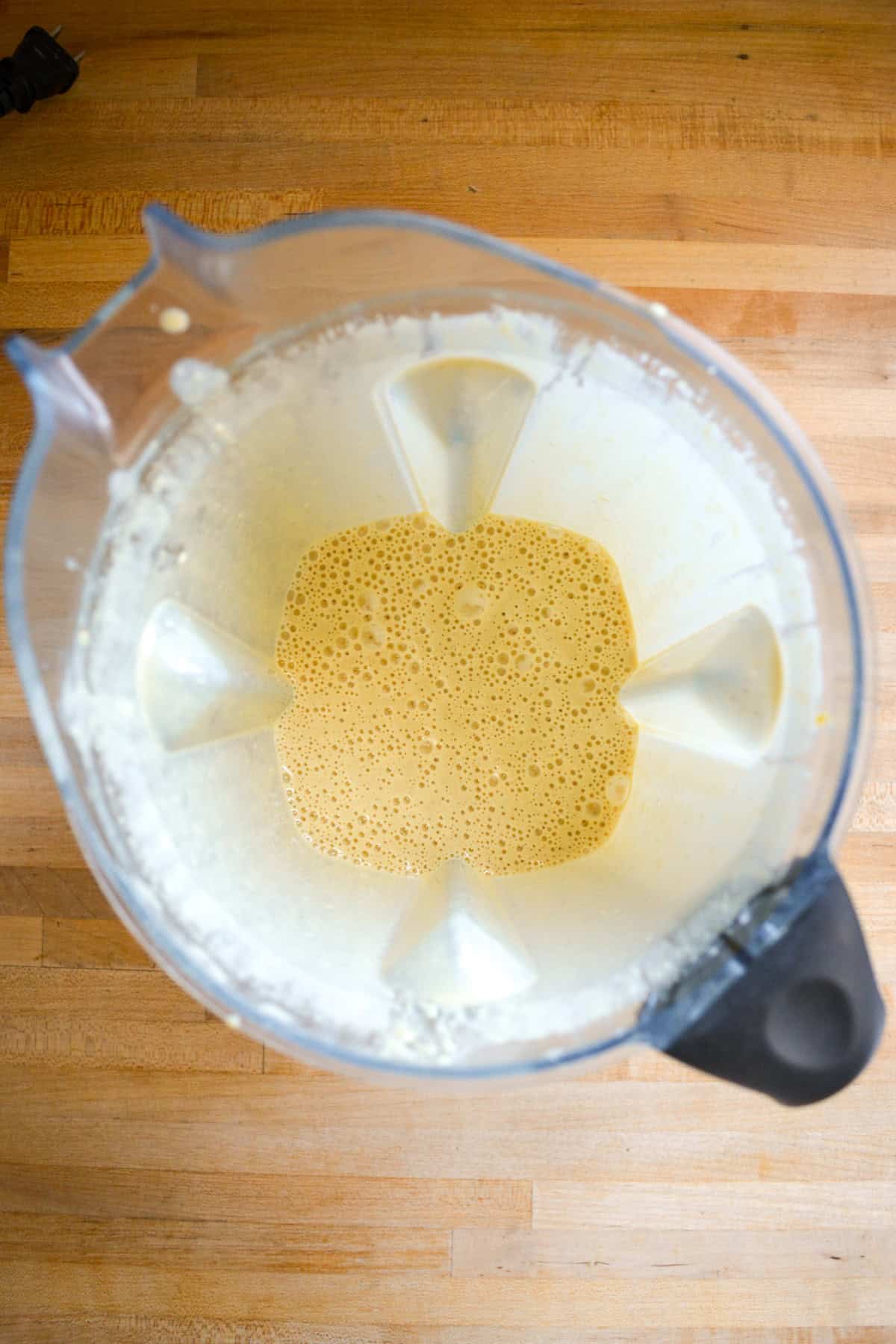 Vegan Cashew Cheese Sauce blended until smooth in the pitcher of a blender.