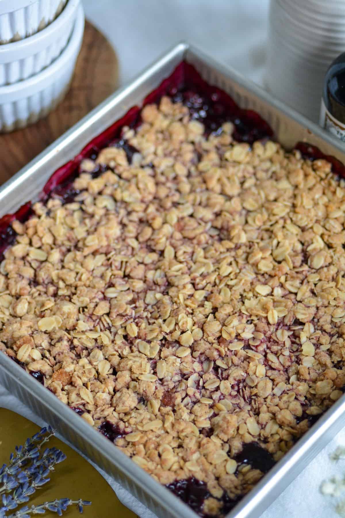 Baked cherry crisp in an 8 by 8 inch square pan.