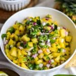 Pineapple Pico de Gallo salsa in a white bowl.