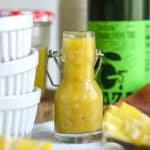 Lemon Shallot Vinaigrette in a small glass jar.
