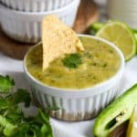 Tomatillo Salsa Verde in a ramekin topped with cilantro.