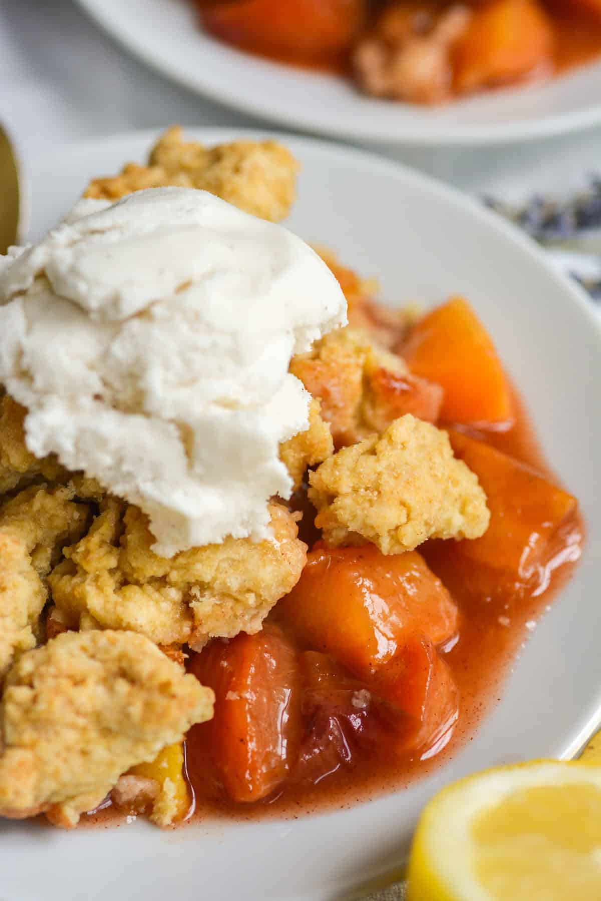 Peach cobbler on a small plate.