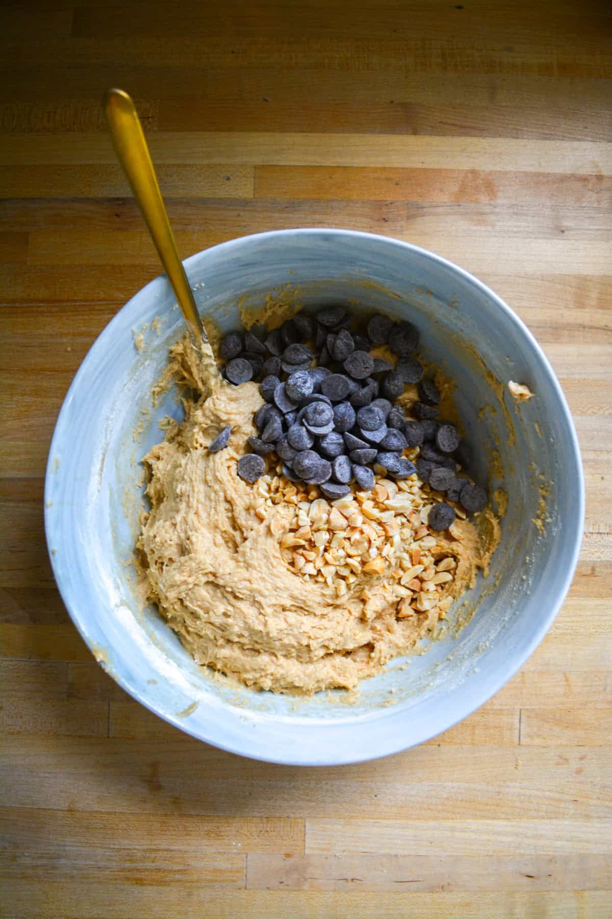 Chocolate chips and chopped peanuts added to the cookie dough.