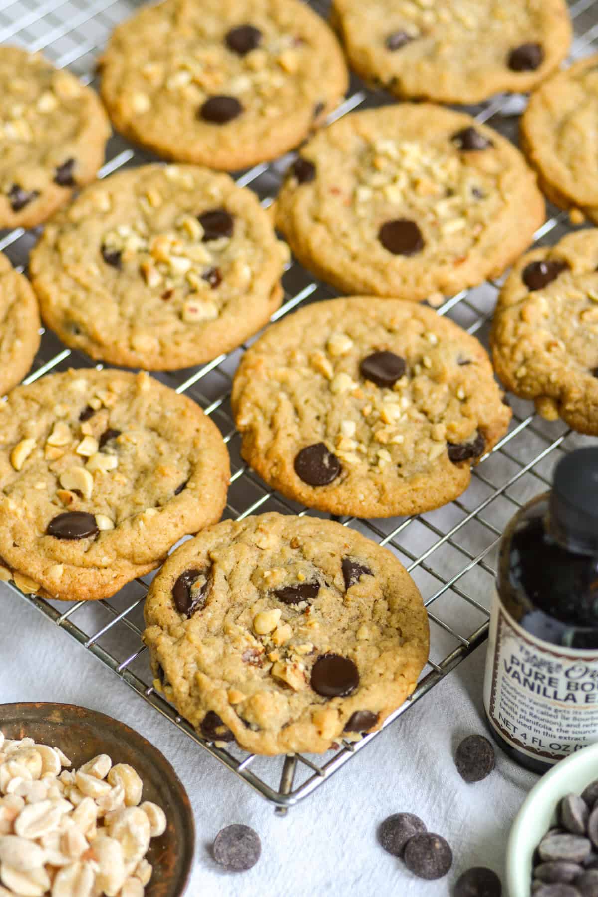 Vegan Peanut Butter Chocolate Chip Cookies on a cooling rack.