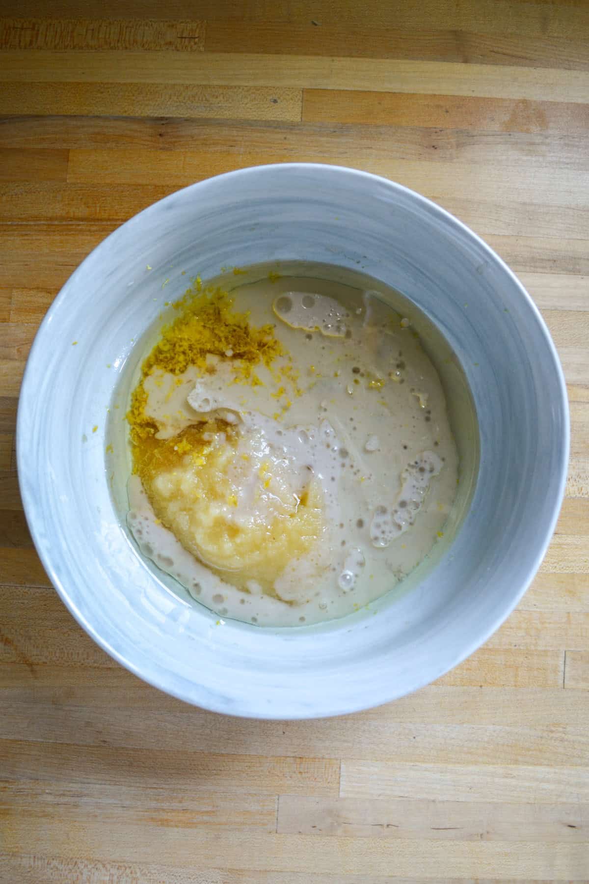 Wet ingredients in a large mixing bowl.