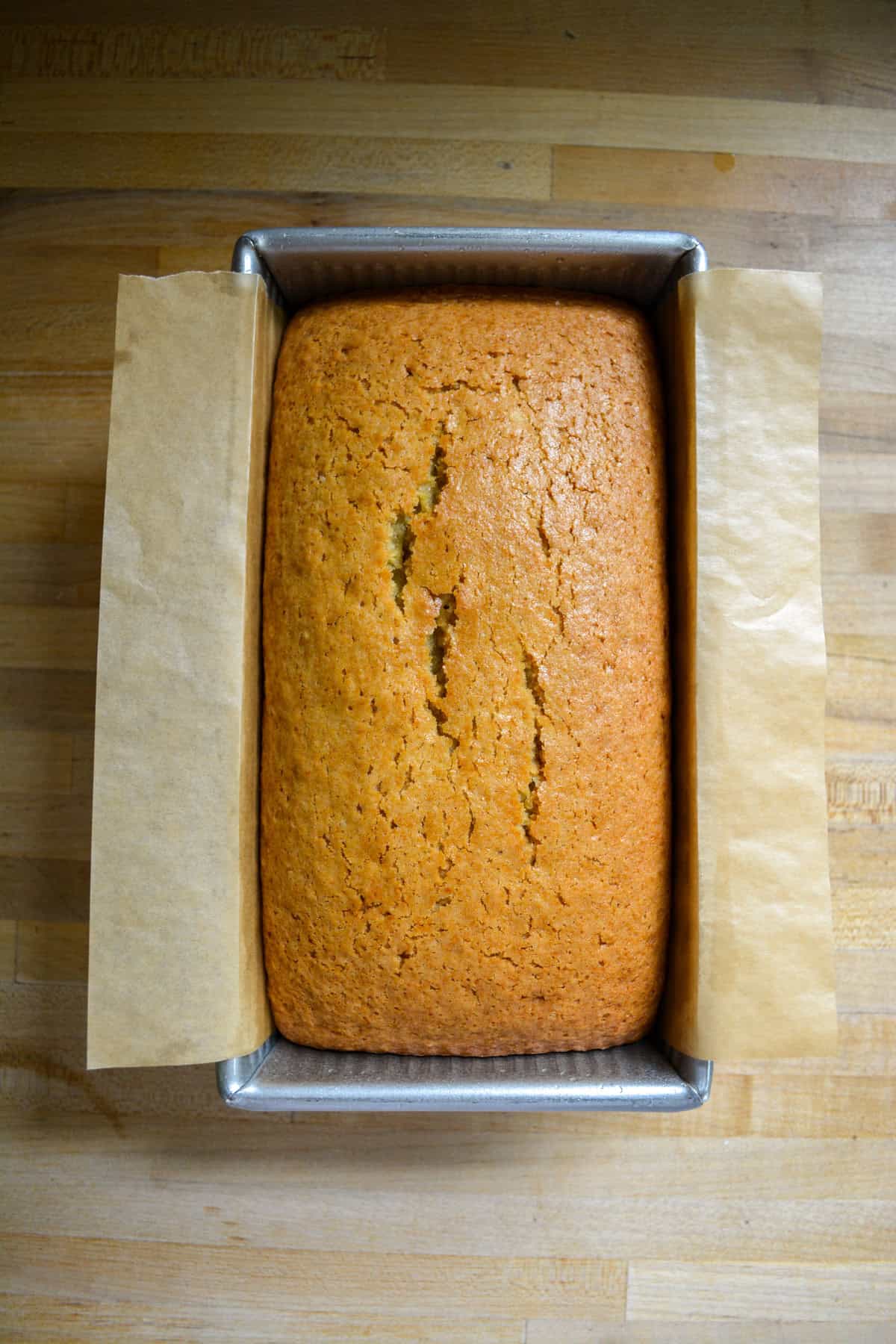 Baked lemon lavender cake in a pan.