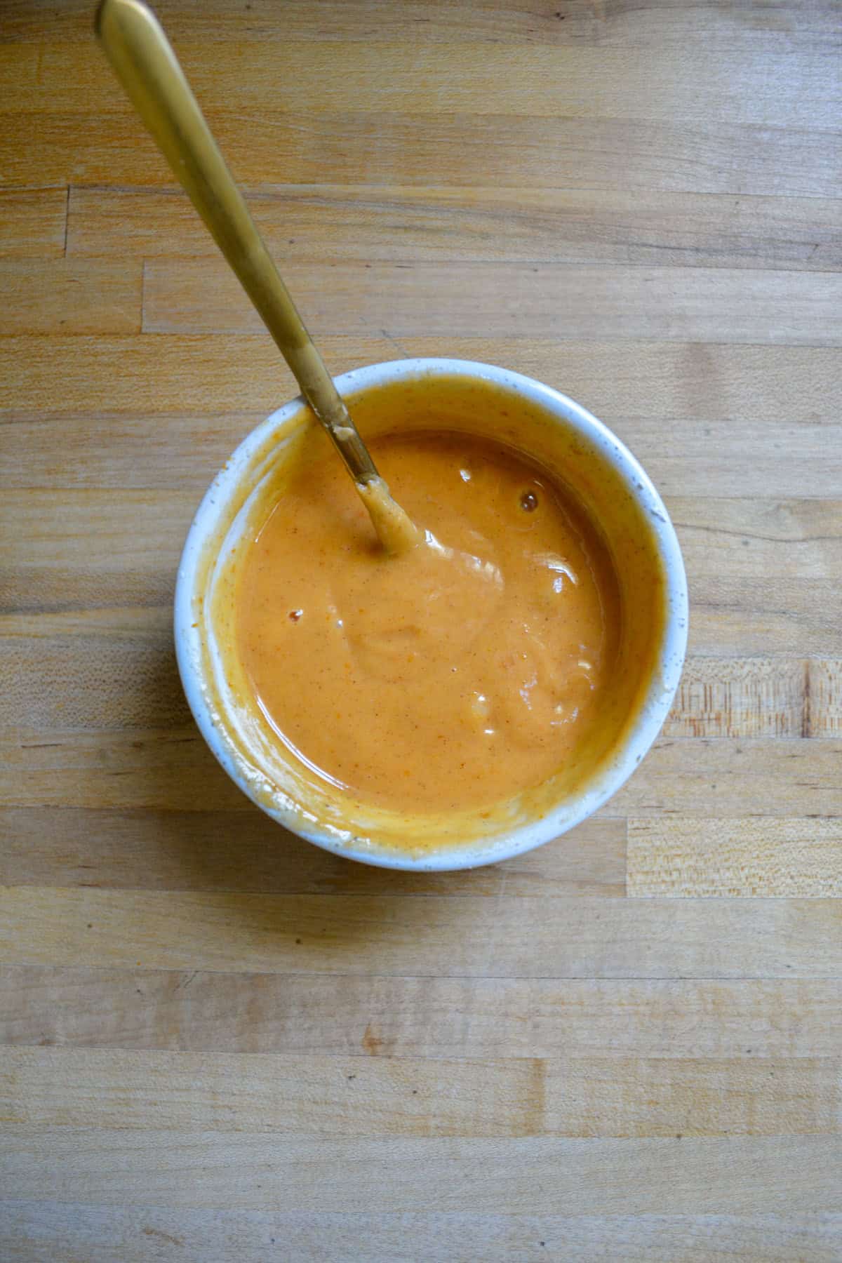 Pumpkin glaze in a small ramekin.