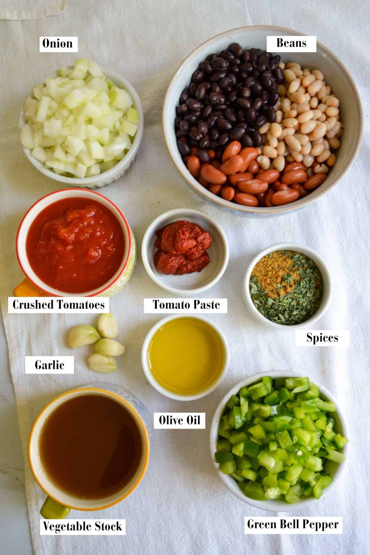 Ingredients for this recipe in small bowls on a linen cloth.