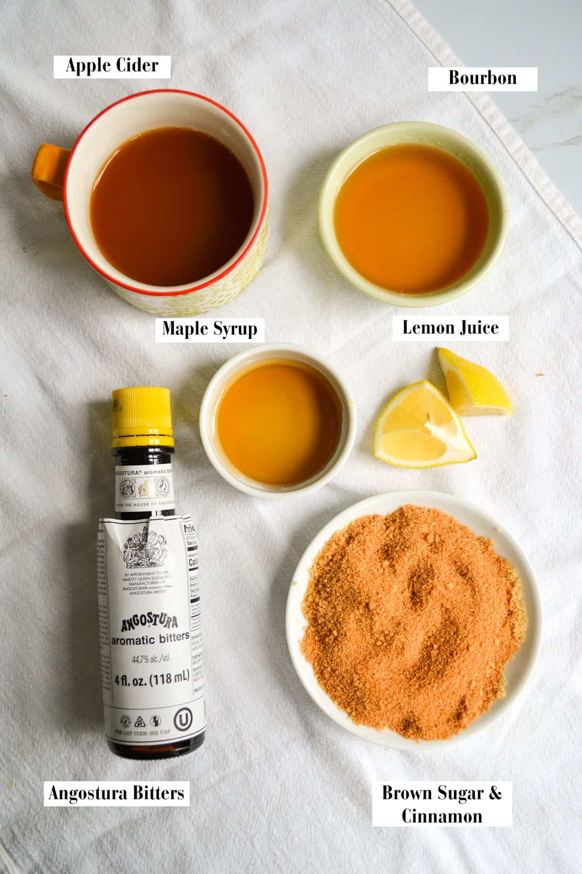 Ingredients for this recipe in small bowls on a linen cloth.