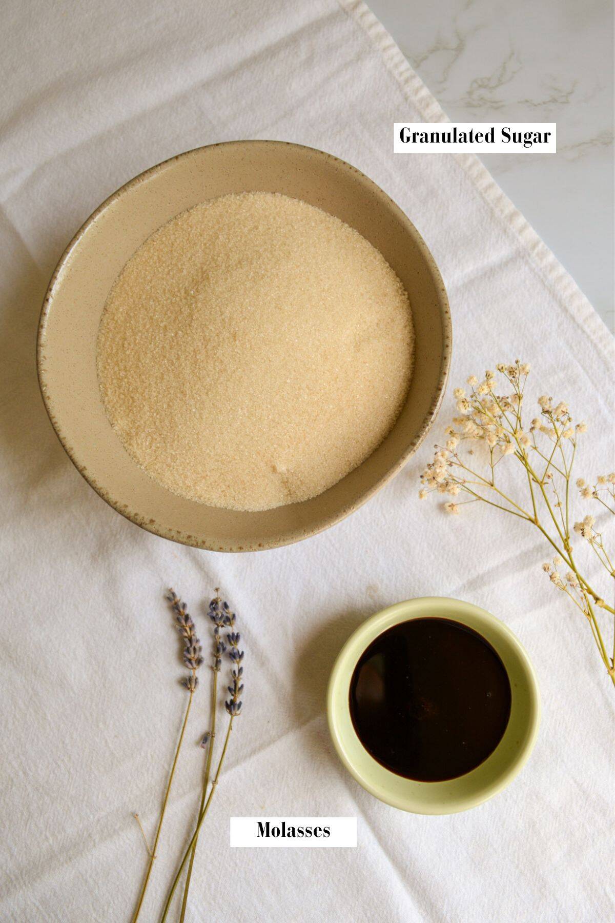 Ingredients for making this recipe in small bowls on a linen cloth.