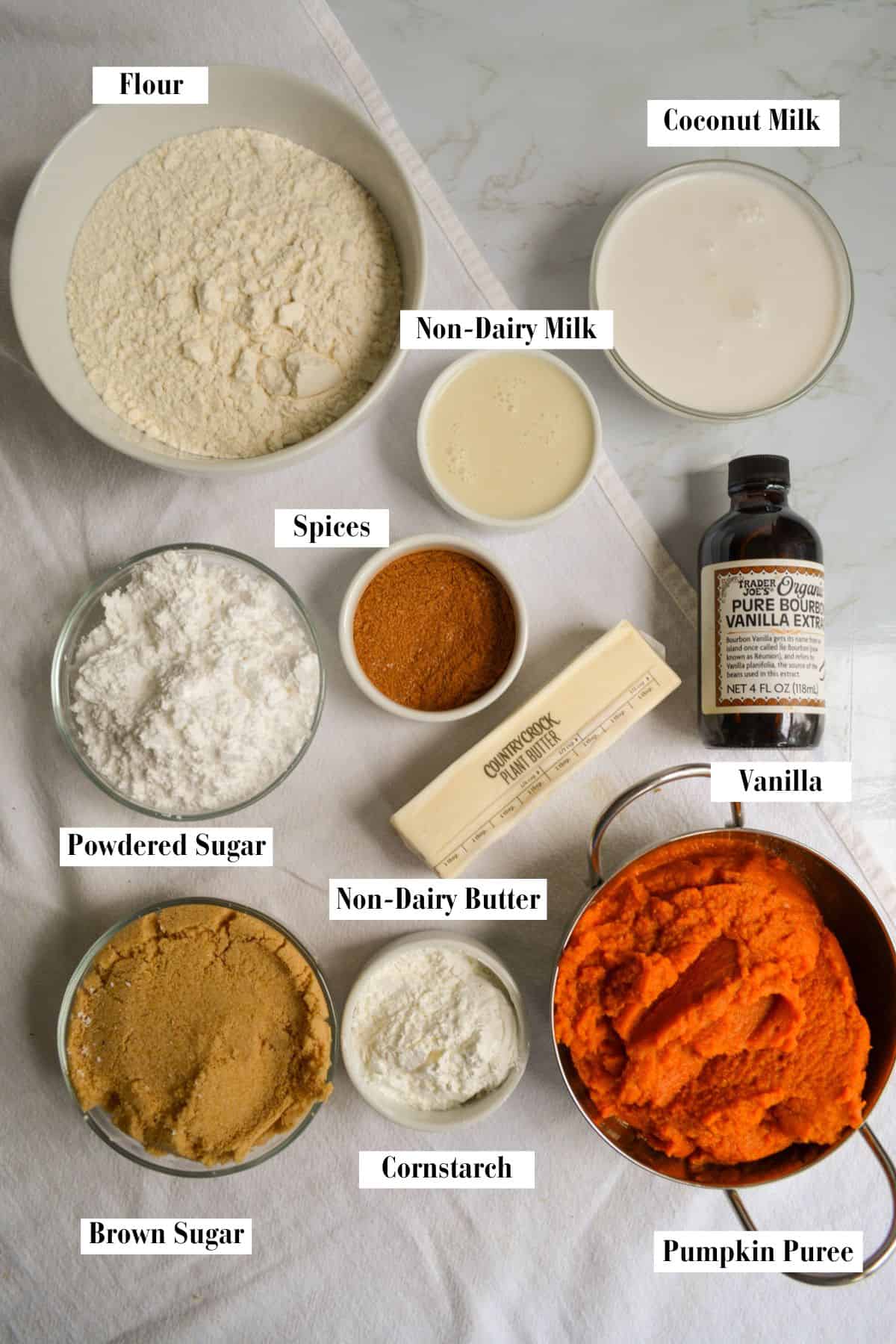 Ingredients for this recipe in small bowls on a linen cloth.