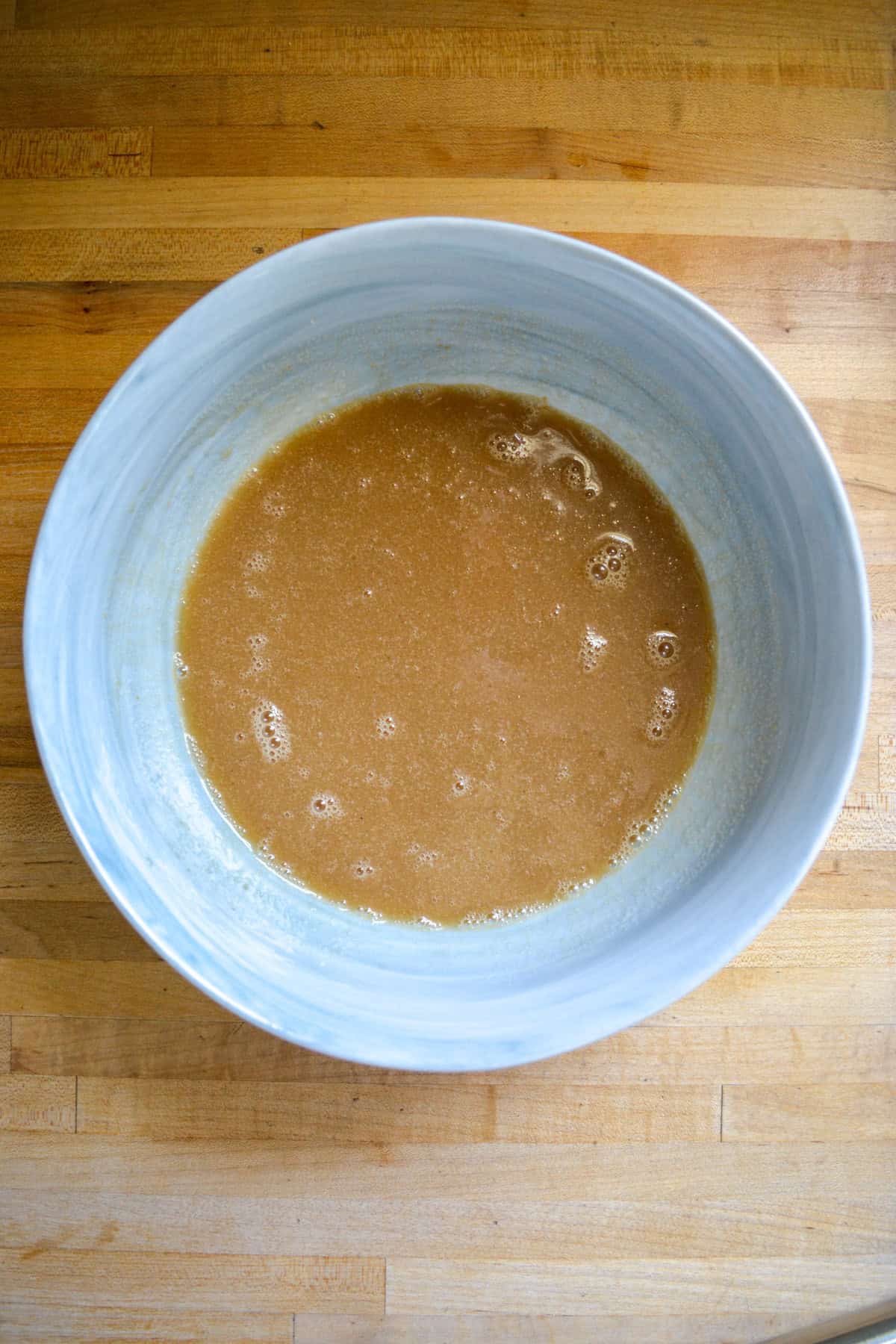 Wet ingredients in a mixing bowl.