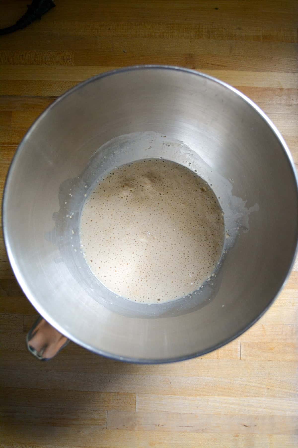 Bloomed yeast in a mixing bowl.