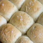 Vegan Dinner Rolls next to each other in a pan.