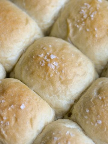 Vegan Dinner Rolls next to each other in a pan.