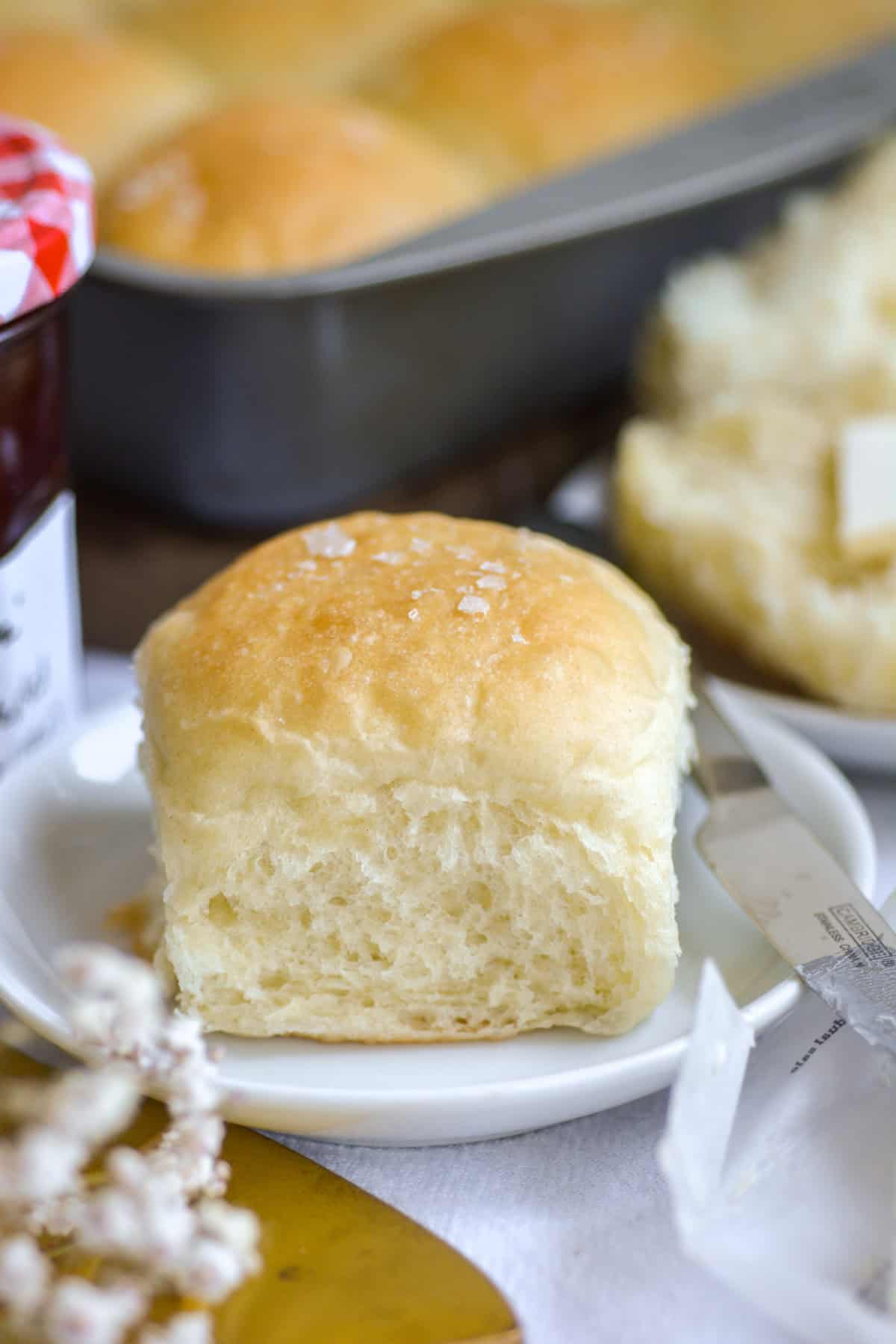 A Vegan Dinner Roll on a small plate.