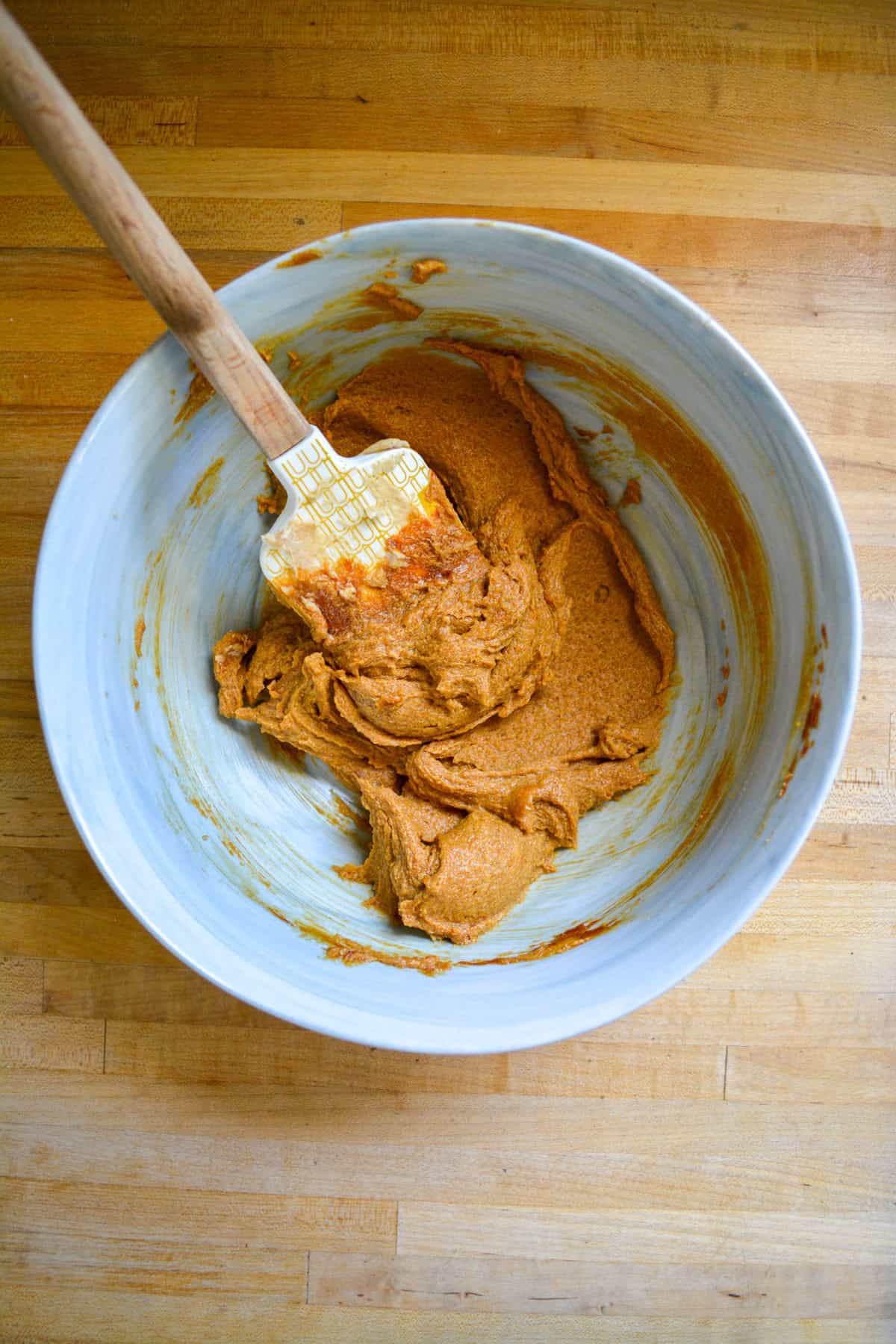 Non-dairy butter, brown sugar and molasses creamed together in a large mixing bowl.