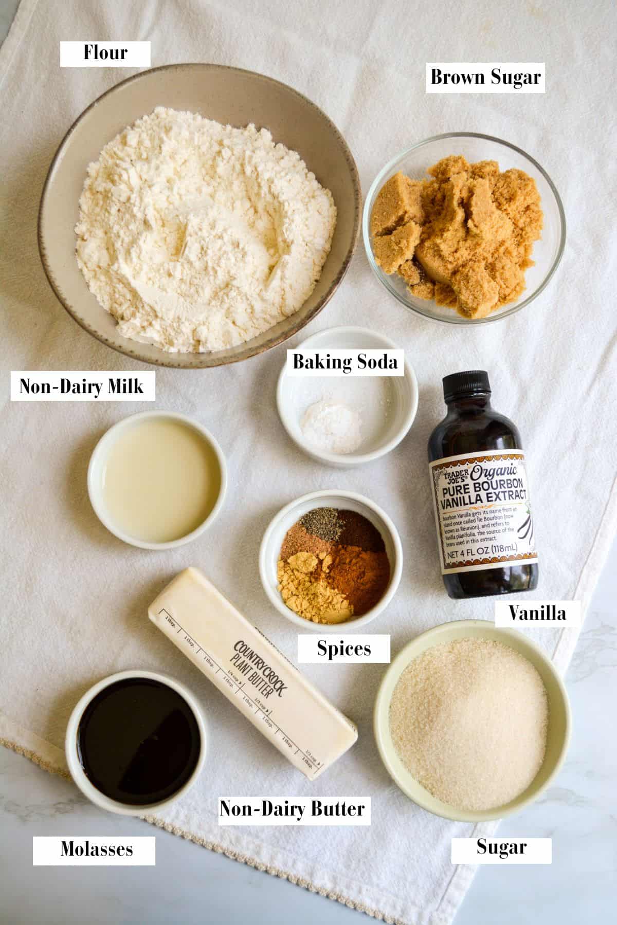Ingredients for making this recipe in small bowls on a linen cloth.
