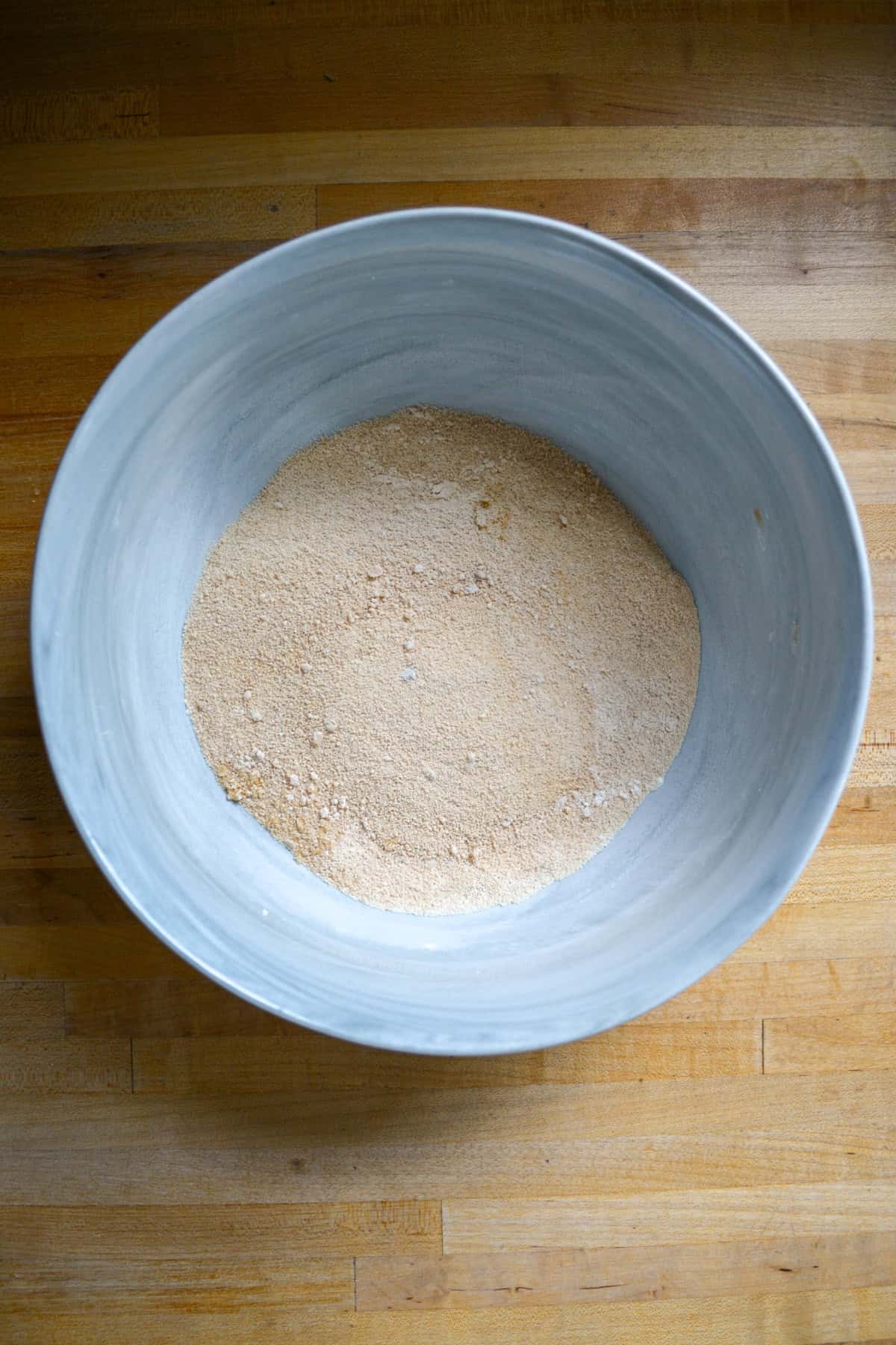 Brown sugar and cornstarch added together in a bowl.