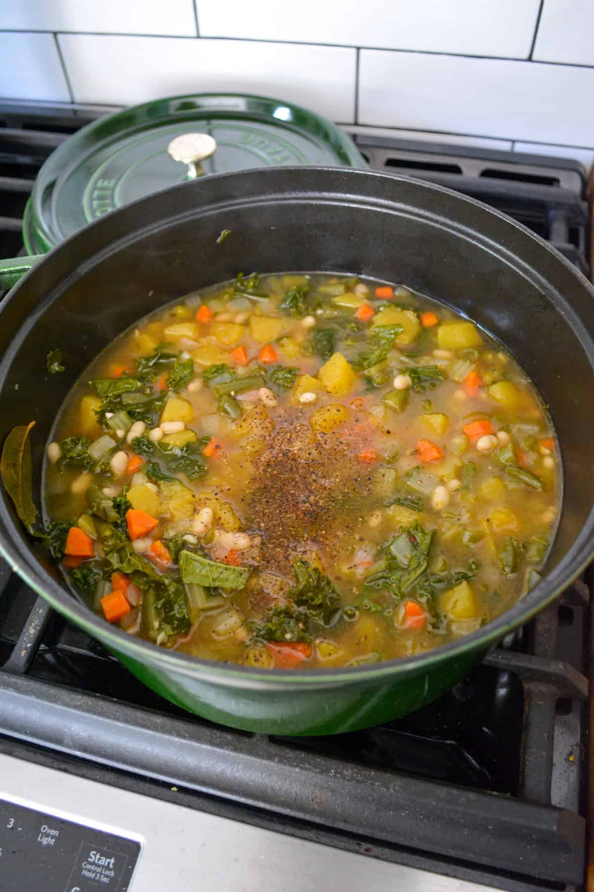 White beans and kale added into the Acorn Squash Soup.