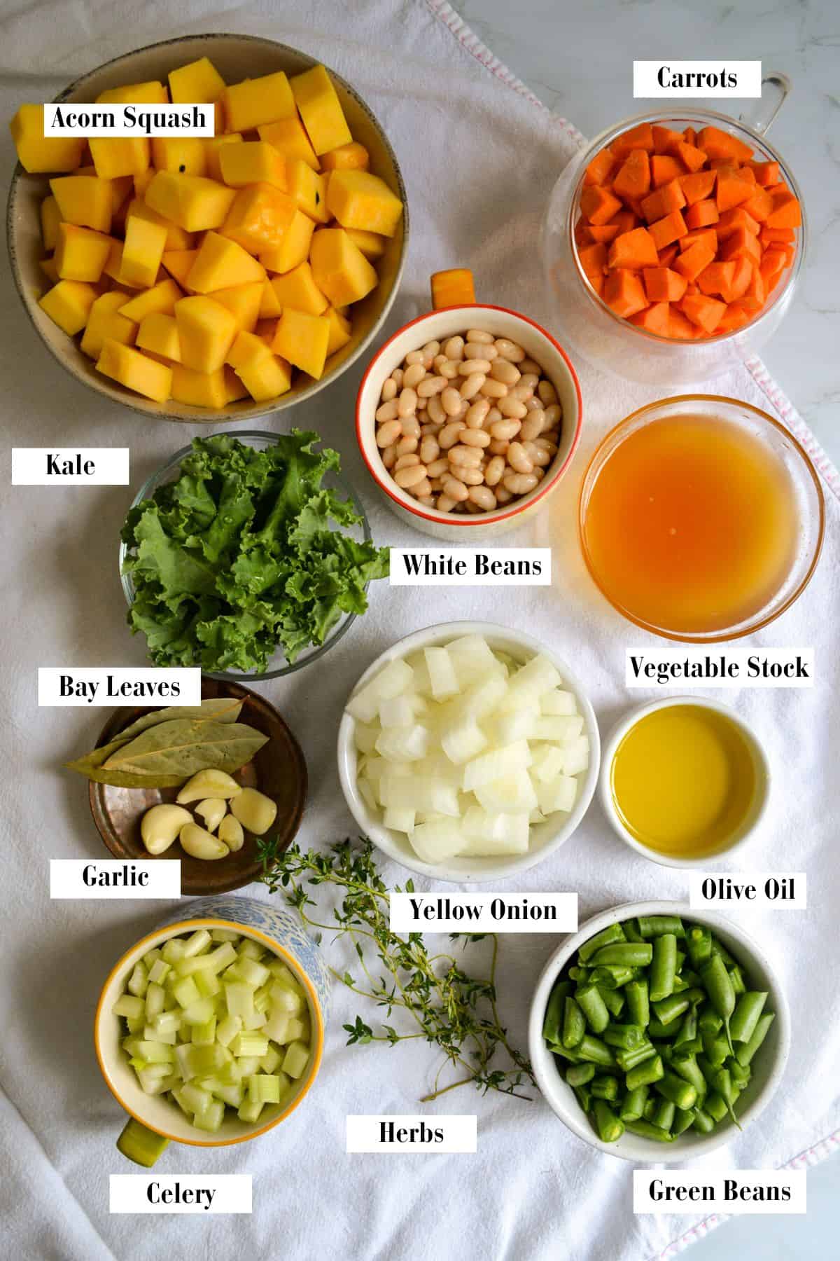 Ingredients for making this recipe in small bowls on a linen cloth.