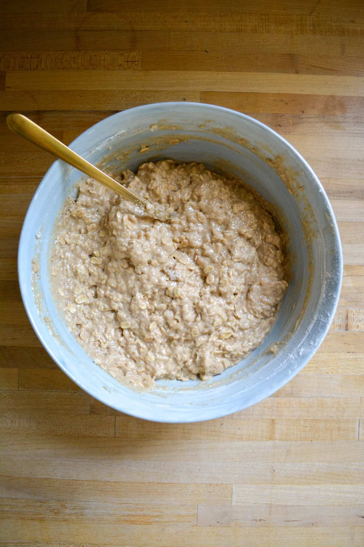 Applesauce Oatmeal Muffin batter in a large mixing bowl.